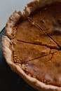Menu Appetizing close-up of a sliced homemade pumpkin pie, perfect for fall desserts.